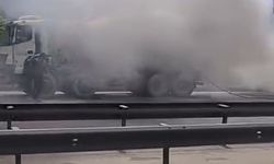 Basın Ekspres’te yanan otomobile hortumla müdahale