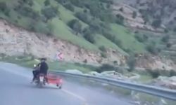 Telef olduğu iddia edilen köpeği motosikletle sürüklediler