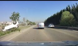 Bursa'da takla atan otomobilden burnu bile kanamadan kurtuldular