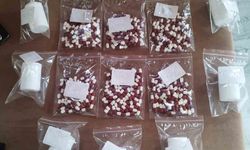 Cips paketinden uyuşturucu çıktı, silahlar ele geçirildi