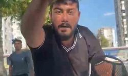 Cam silme bahanesiyle aracın kaputuna yatıp zorla para istemişti, tutuklandı
