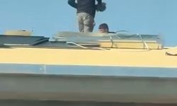 Canlarını hiçe sayarak çatıda önlem almadan çalıştılar