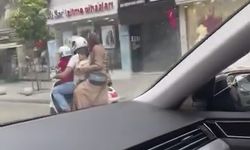 Motosiklette tehlikeli yolculuk