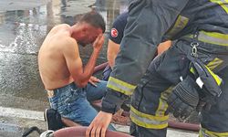 Üzerine döktüğü benzin gözlerinden ediyordu