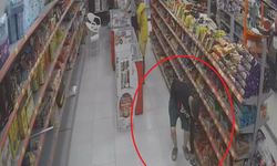 Yaptığıyla şaşırtan hırsız, 100 TL’lik enerji içeceği ve bisküvi çaldı: O anlar kamerada