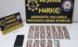 Akşehir’de sahte kimlikle yakalanan şahıstan uyuşturucu hap çıktı