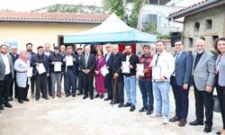 Bursa Ürünlü'de 275 hak sahibine imarlı tapu sevinci