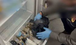 Buzdolabından esrar ve kokain gardıroptan tabanca ve para çıktı