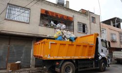 Çöp evden 115 bin lira ve ruhsatsız silah çıktı