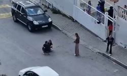 Sokak ortasında karısını dövdü, okuldaki çocuklar izledi