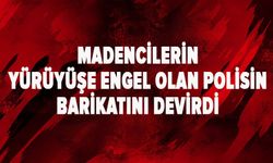 Madencilerin yürüyüşe engel olan polisin barikatını devirdi