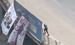 Adana'da köprüye NATO protestosu için pankart asan şahıs gözaltına alındı