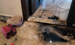 Tartıştığı eski kız arkadaşının daire kapısını benzinle ateşe verdi