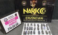 Mide ve bağırsaklarında 1 kilo 99 gram eroin taşıdılar