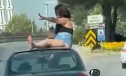 Seyir halindeki otomobilde tehlikeli görüntüler: Sürücü ve kadın yolcu gözaltında