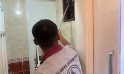 Alanya'da havalandırma bacasına düşen kedi ekipler tarafından kurtarıldı
