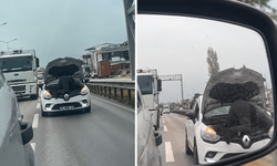 Bursa’da şaşkına çeviren görüntü: Seyir halindeki otomobilin kaputunda tamir