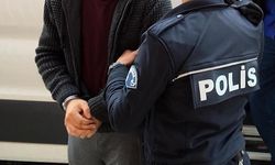 Aranan şüpheli 11 yaşındaki çocuğu rehin aldı