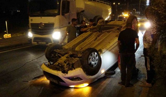 Refüje çarparak ters dönen araçtan burnu kanamadan çıktı