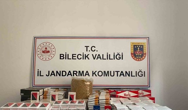 Jandarmanın baskın yaptığı evde kaçak tütün ve ruhsatsız silah ele geçirildi