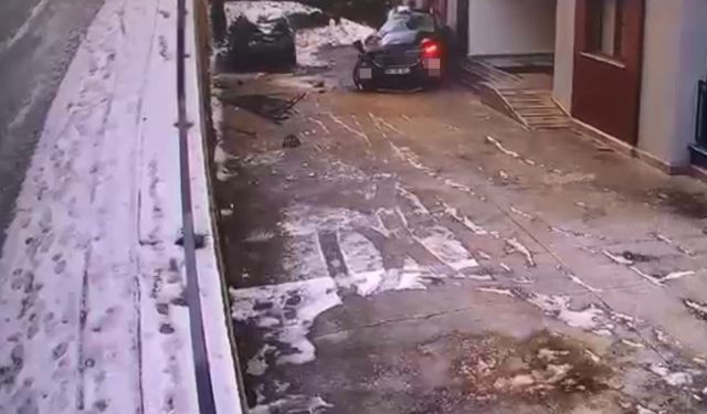 Buzlanan yolda kontrolden çıkan cip sitenin bahçesine uçtu