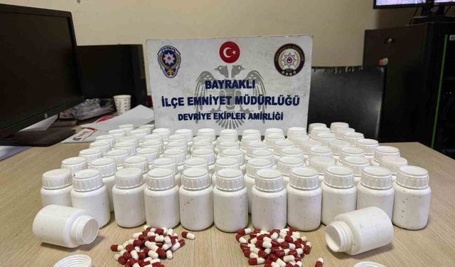 İzmir'de mezarlıkta poşet içerisinden binlerce uyuşturucu hap çıktı