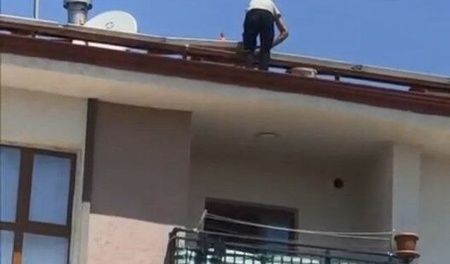 Çatıdaki tehlikeli çalışma kameraya yansıdı