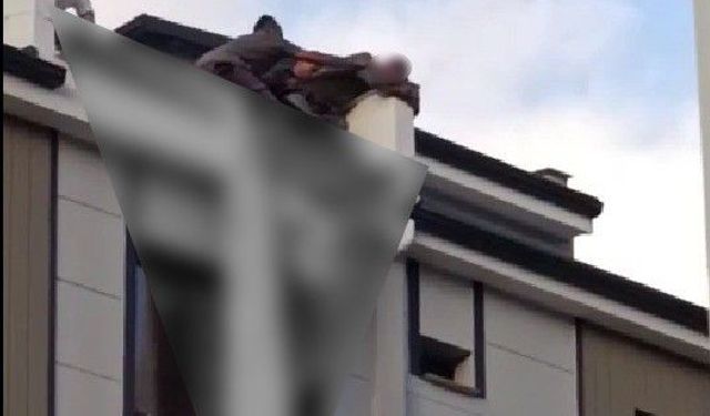 Eşiyle tartışıp çatıya çıkan genci Başkan son anda çekip aldı