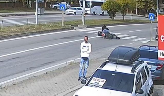 Kırmızı ışığı son anda fark etti, motosikletten düştü
