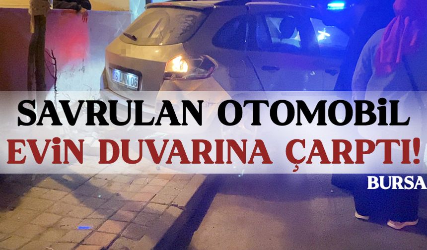 Bursa'da savrulan otomobil evin duvarına çarptı