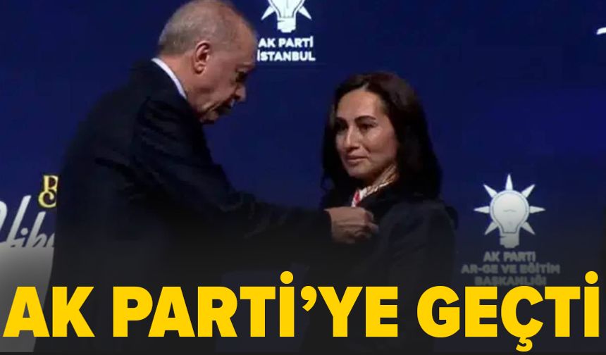 Cumhurbaşkanı Erdoğan Özlem Vural Gürzel'in rozetini taktı