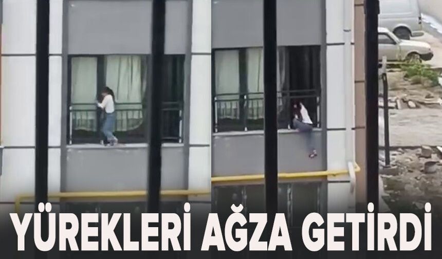 Camdan çıkarak korkulukta gezinen çocuk, yürekleri ağza getirdi