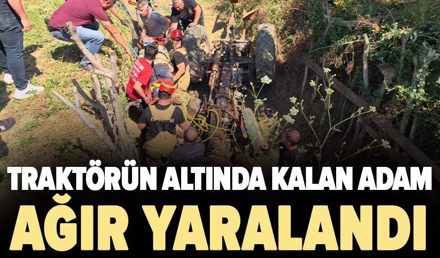 Traktörün altında kalan adam ağır yaralandı