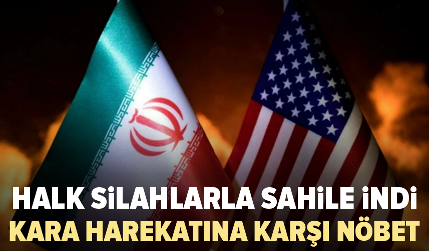 İran’da halk sahilde silahlı devriyeye çıktı