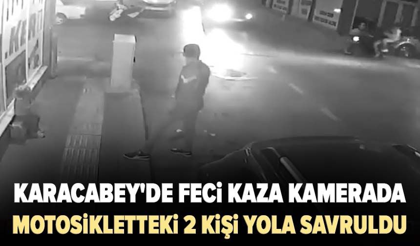 Karacabey'de feci kaza kamerada: Motosikletteki 2 kişi yola savruldu