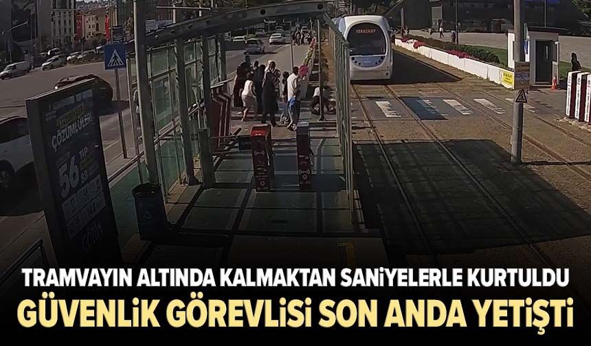 Tramvayın altında kalmaktan saniyelerle kurtuldu! Güvenlik görevlisi son anda yetişti